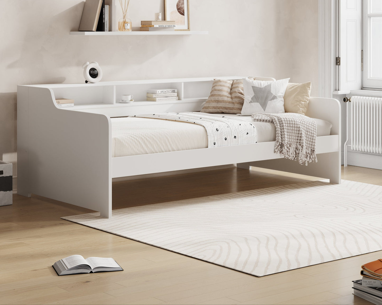 Modern bedroom with a white bed and 'Millie & Jones' branding on the wall.