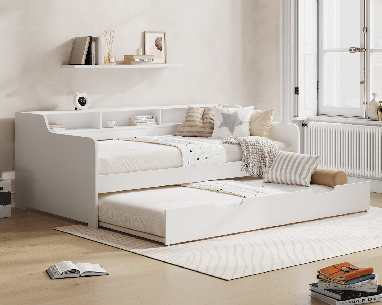 Modern bedroom with a white bed and Millie & Jones branding on the wall.