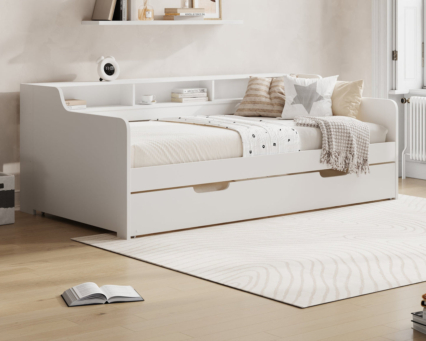 White bed with bedding in a room with 'Millie & Jones' branding.