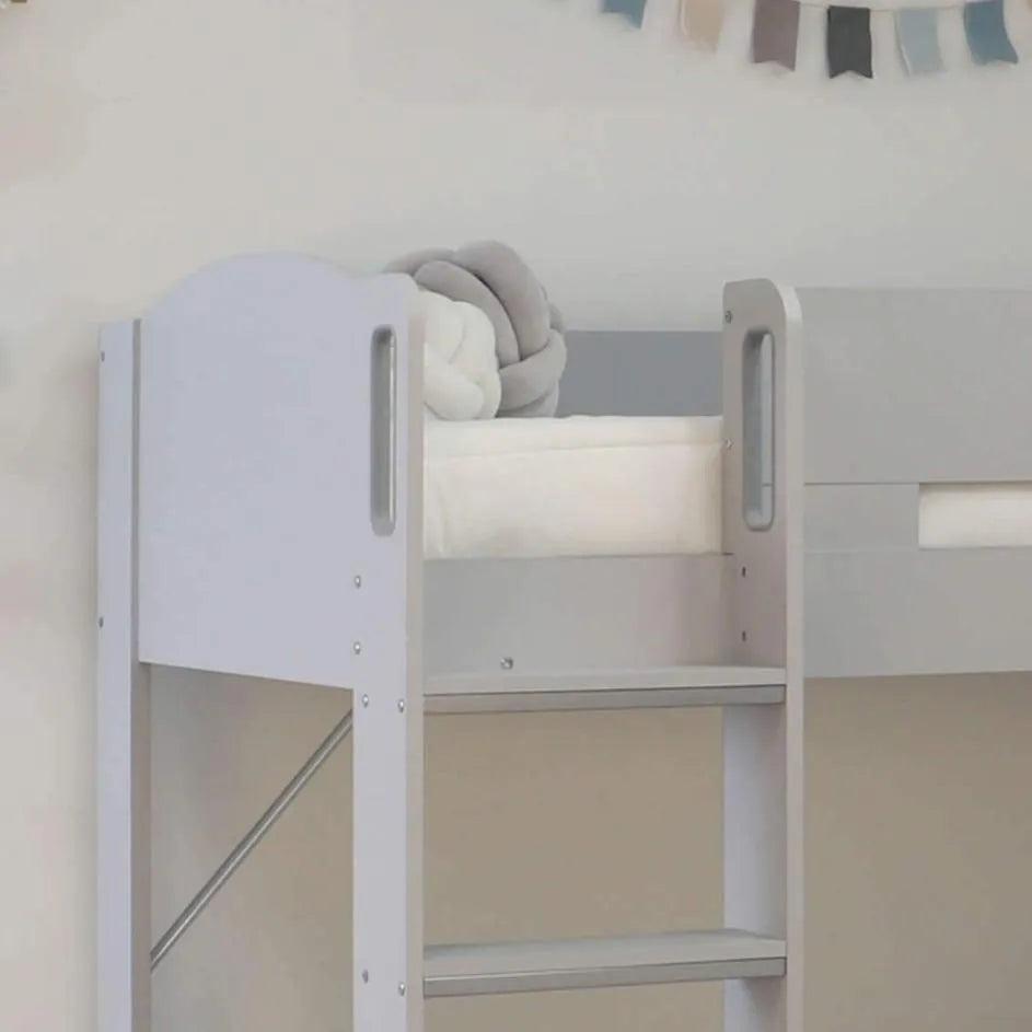Top bunk of the Ripley Bunk Bed in grey, with the ladder and the hand-holds in the end panel