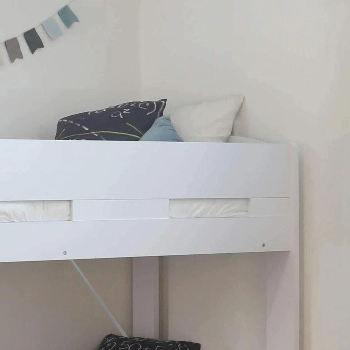 Safety sides around the top bunk of the Ripley Bunk Bed in white