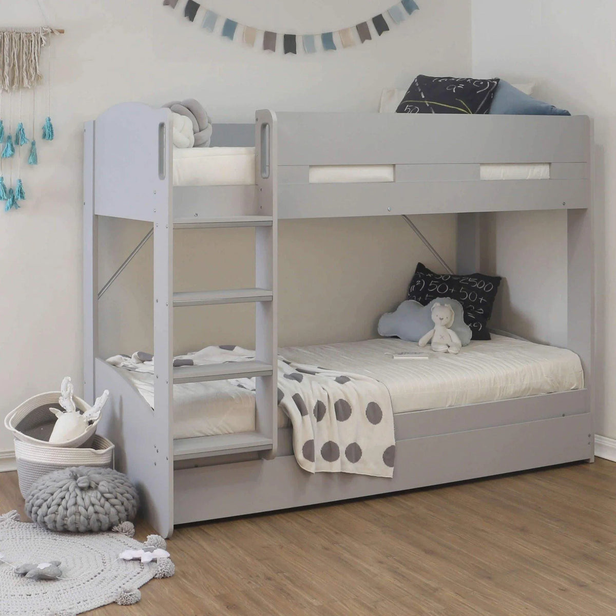 Ripley Bunk Bed in grey, with the trundle closed under the bottom bunk