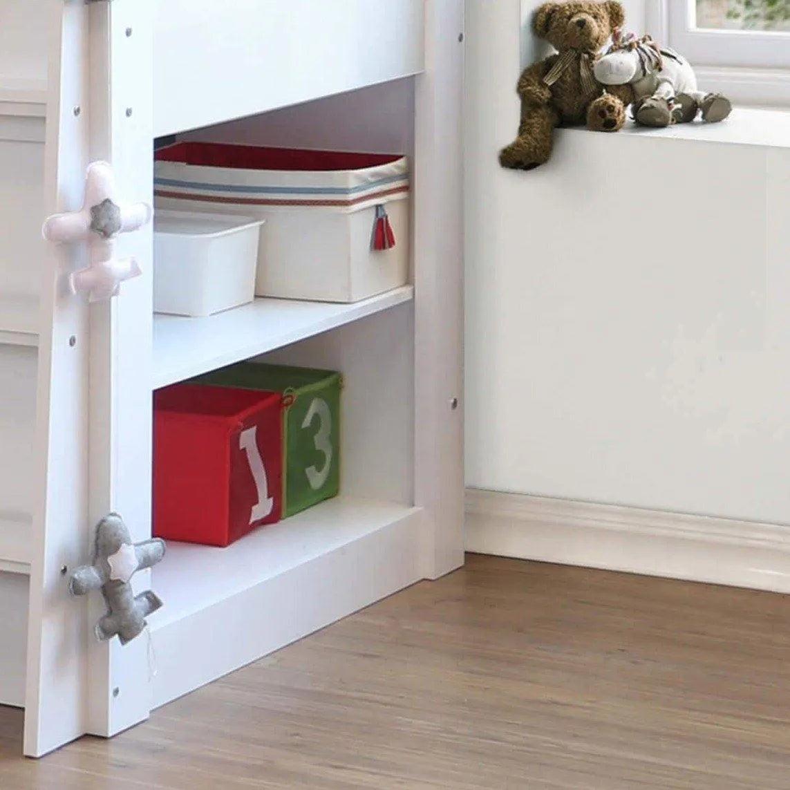 Open shelves built into the ladder end of the Ripley Mid Sleeper in white