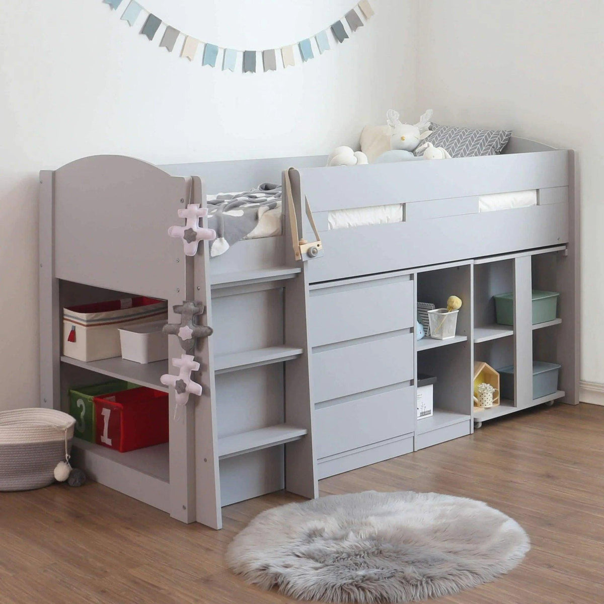 Ripley Mid Sleeper in grey, with the desk tucked under the bed beside the drawers