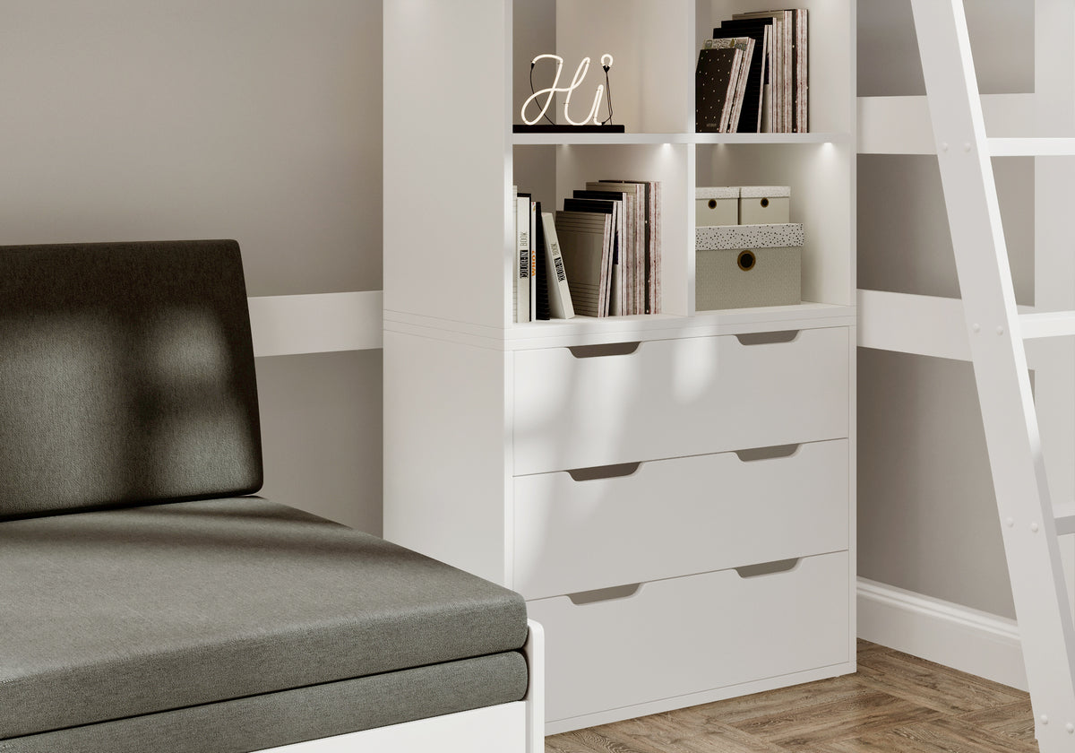 Eton High Sleeper in white, close-up of the black sofa beside the open cubes and three-drawer chest