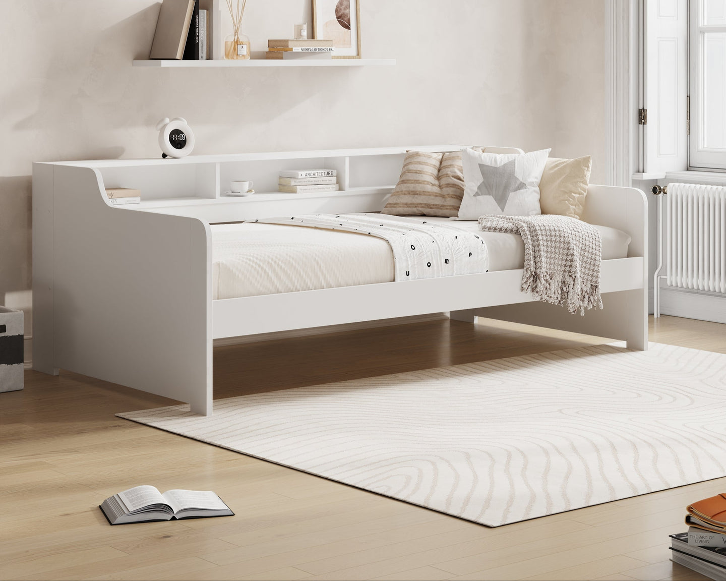 Modern bedroom with a white bed and 'Millie & Jones' branding on the wall.