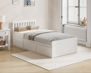 White bed with bedding in a bedroom setting, featuring Millie & Jones branding.