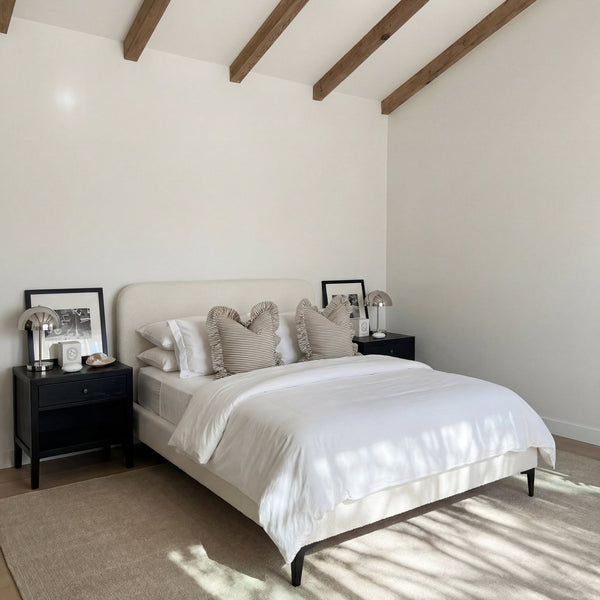 Ambleside boucle bed with curved headboard