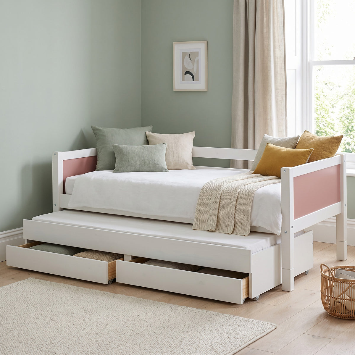 Ashdown daybed with rose head and footboard panels, trundle and drawers pulled out