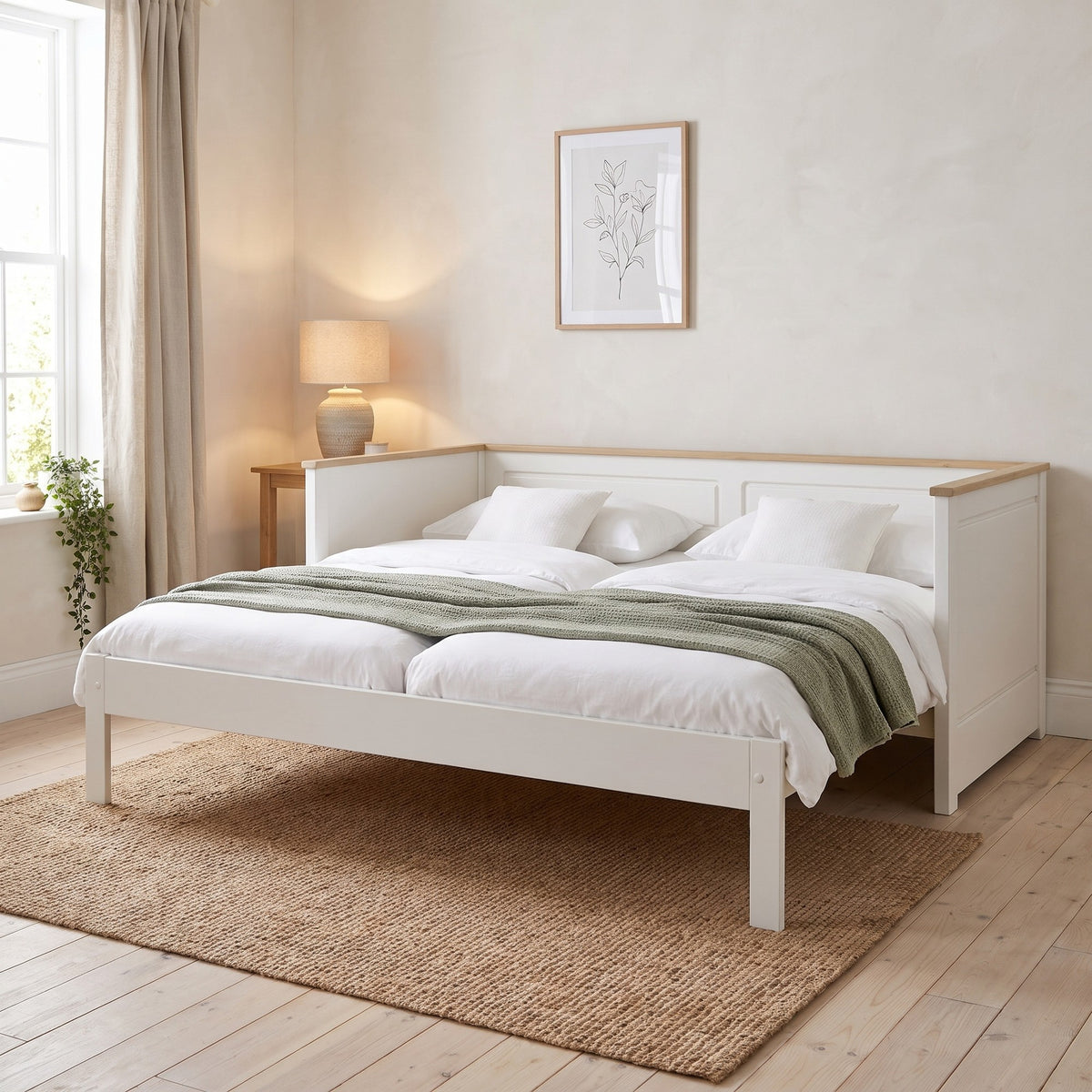 Ashwell daybed pulled out to take two single mattresses side by side, 180cm across