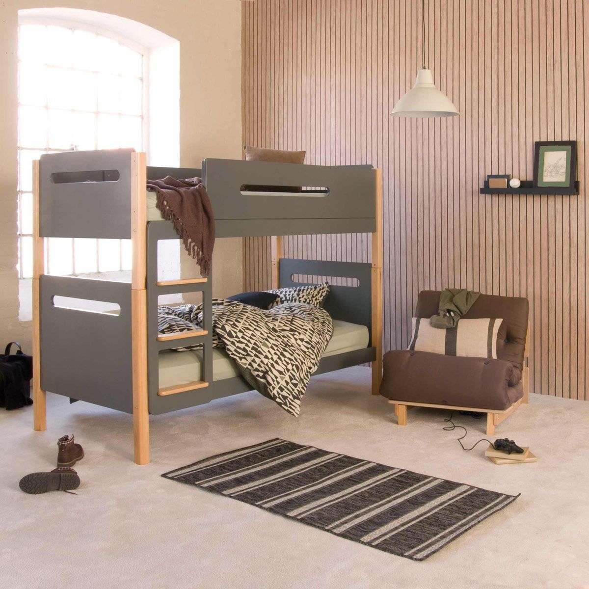 bunk beds with brown futon chair
