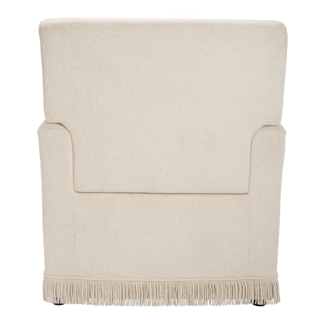 Clarendon fringed velvet armchair with bolster cushion