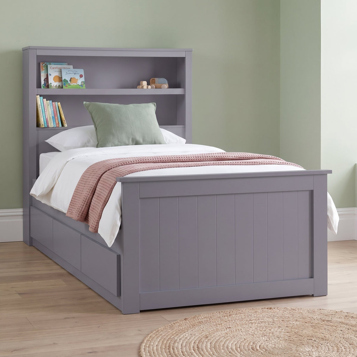 Hartley grey bookcase storage bed seen from the foot end, showing the panelled footboard