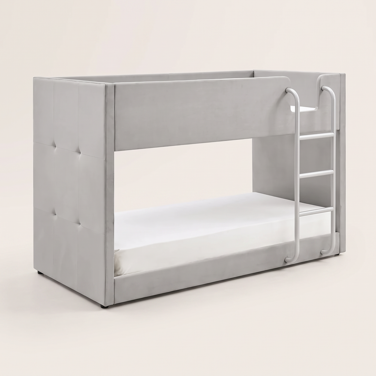 Hadleigh grey velvet bunk bed on a plain background with a mattress on the bottom bunk