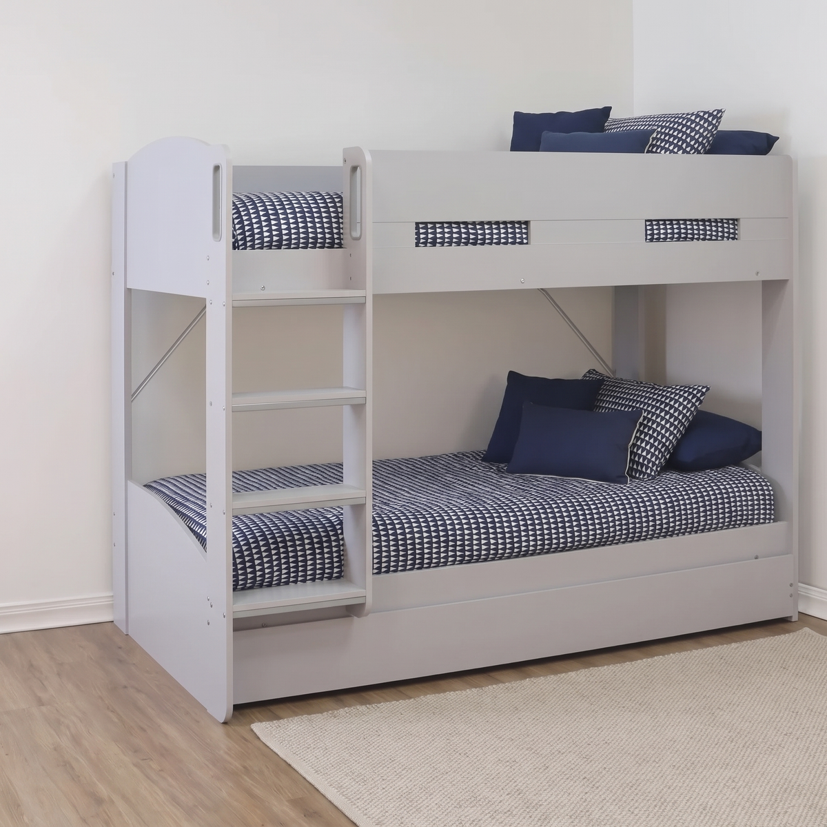 Ripley bunk bed in grey with the trundle closed under the bottom bunk